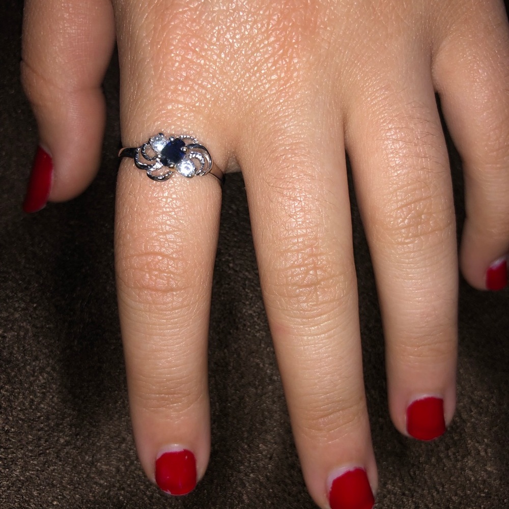 14 karat ring with 2 diamonds and a sapphire